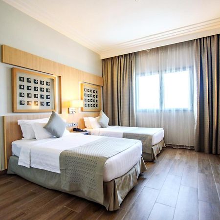 Golden Tulip Le Diplomate Hotel Котону Екстериор снимка
