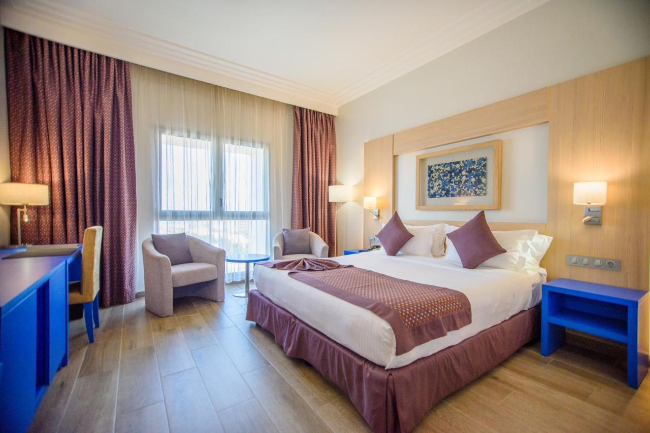 Golden Tulip Le Diplomate Hotel Котону Екстериор снимка