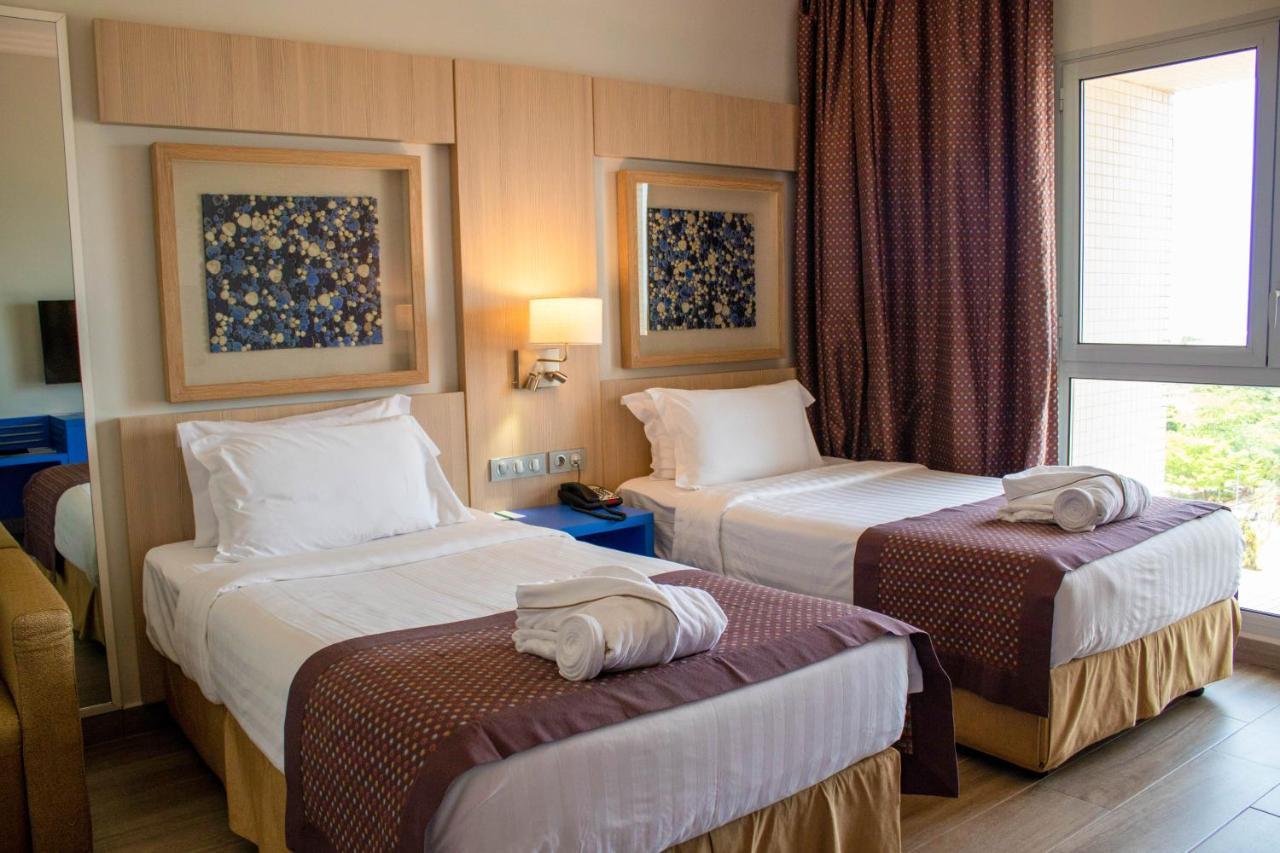 Golden Tulip Le Diplomate Hotel Котону Екстериор снимка