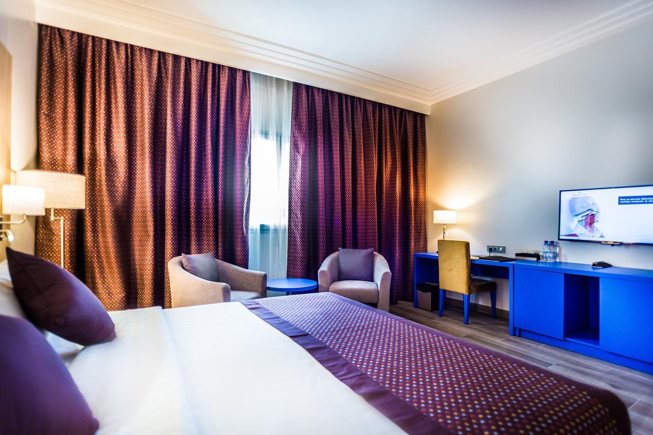 Golden Tulip Le Diplomate Hotel Котону Екстериор снимка